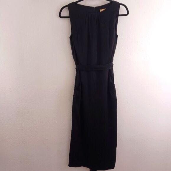 St John Couture black sleeveles front pockers dress size 6